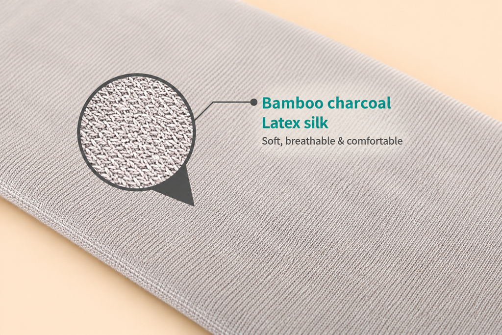 Close-up of Venaflow bamboo charcoal latex silk compression fabric showing its fine knitted texture